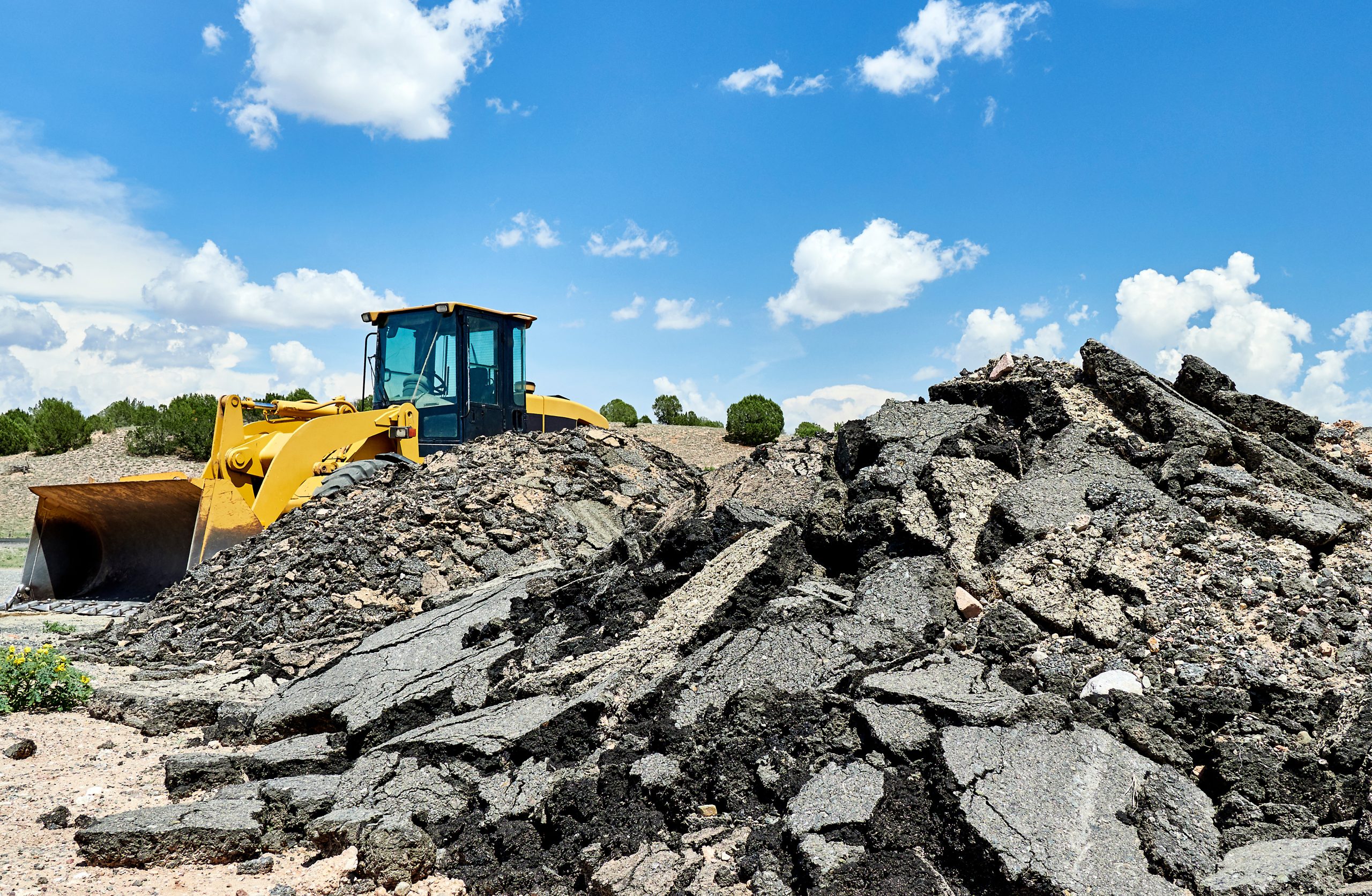 Pile Of Asphalt Road Paving with Loader